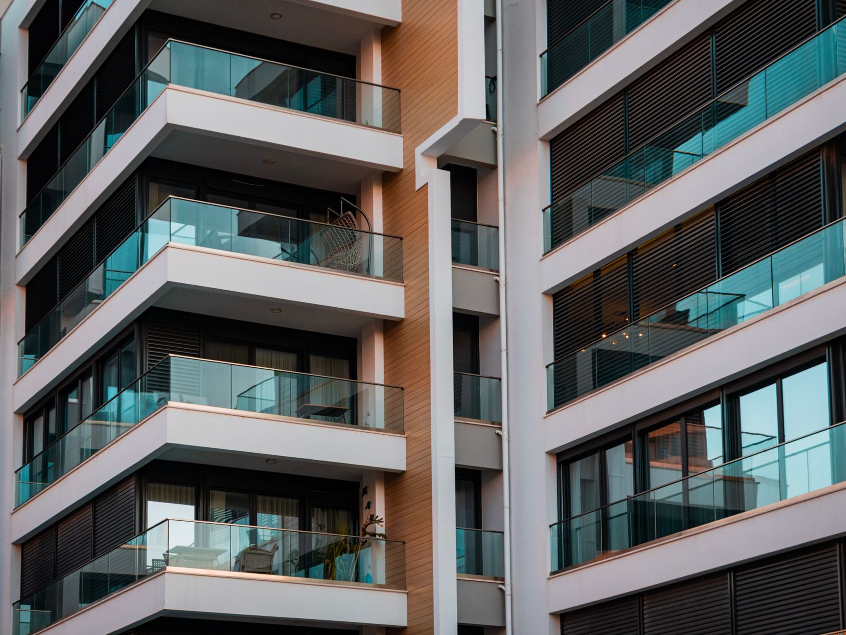 Contemporary architecture showcasing glass balconies and sleek design. — Understanding the Role of a Land Surveyor in Salt La